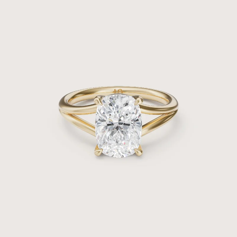 Pear - shaped diamond engagement ring with side baguette diamonds in 18K goldMargot Elongated Cushion Split Band Solitaire