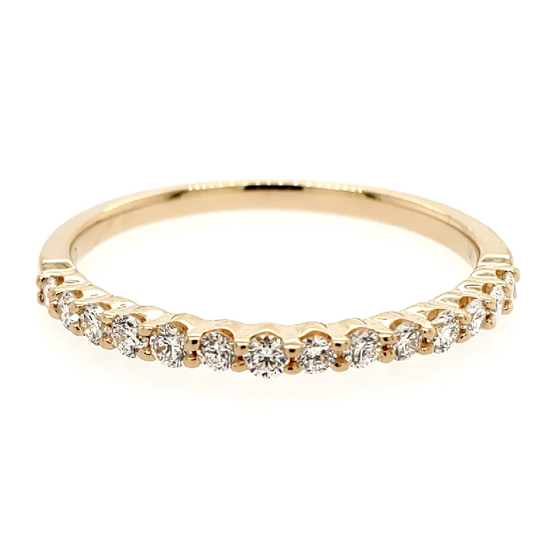 Ruby and diamond engagement ring with a halo of diamonds in 14K red goldClassic Pave Diamond Band in Yellow Gold- 0.30 ctw.