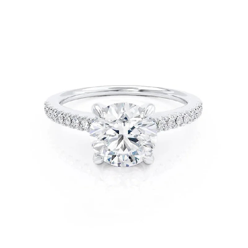 Princess - cut diamond engagement ring with a pavé - set band in platinumCATALINA - Round Moissanite Platinum Shoulder Set Ring