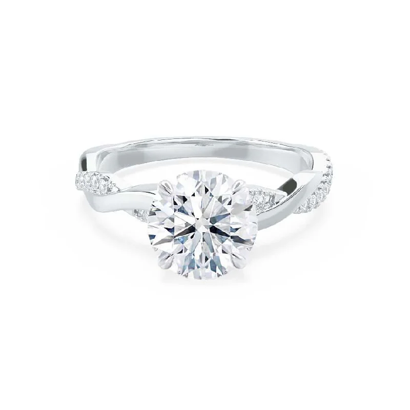 Cushion - cut diamond engagement ring with a halo of moissanite in a silver - plated bandEDEN - Round Moissanite & Diamond 950 Platinum Vine Solitaire Ring