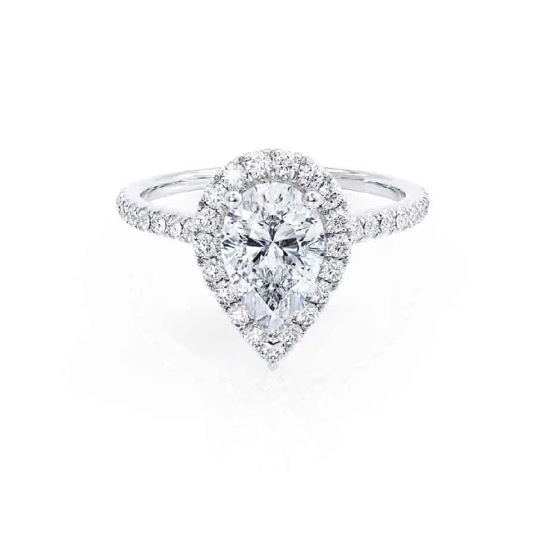 Radiant - cut diamond engagement ring with a bezel - set center stone in 18K yellow goldHARLOW - Pear Moissanite & Diamond Platinum Halo