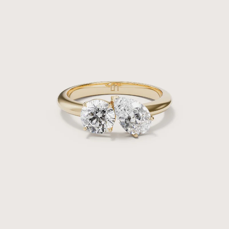 Marquise - cut diamond engagement ring with a split - shank band in platinumVespera Toi-et-moi Pear Round Two Stone