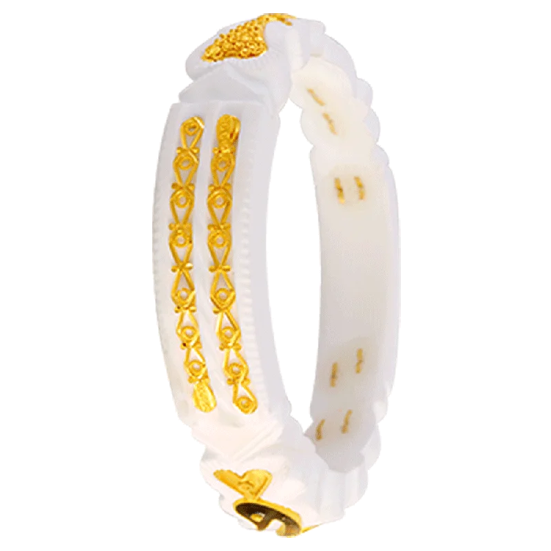 Three - Stone Women's Diamond Rings Symbolizing Past, Present, and Future with Emerald - Cut Diamonds22KT Yellow Gold Sankha Bangle For Women