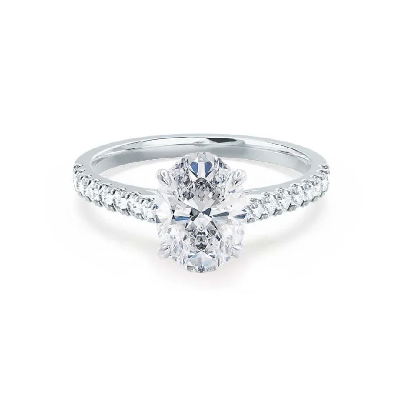 Cushion - cut diamond engagement ring with a halo of moissanite in a silver - plated bandVIOLA - Oval Moissanite & Diamond Platinum Shoulder Set Ring