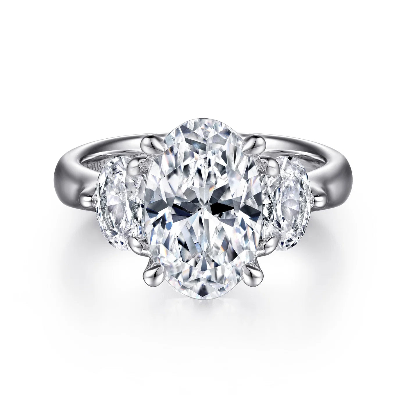 Solitaire diamond engagement ring with a platinum setting for a classic and elegant lookLaynie Oval Three-Stone Diamond Engagement Ring in 18k Gold