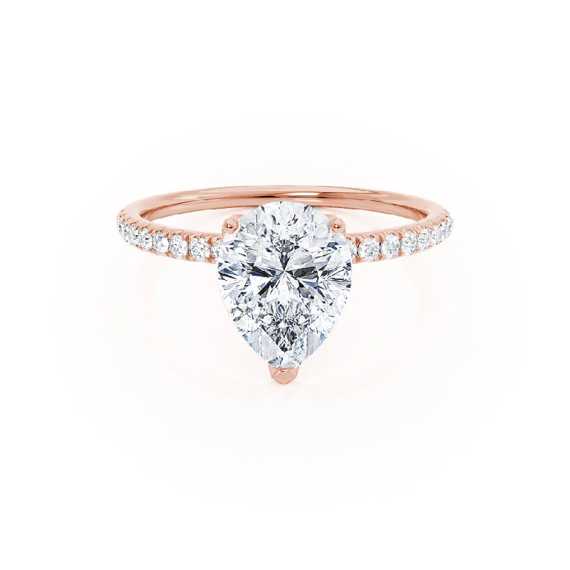 Opal and diamond engagement ring in a contemporary silver band with black - rhodium accentsMACY - Pear Moissanite 18k Rose Gold Petite Shoulder Set