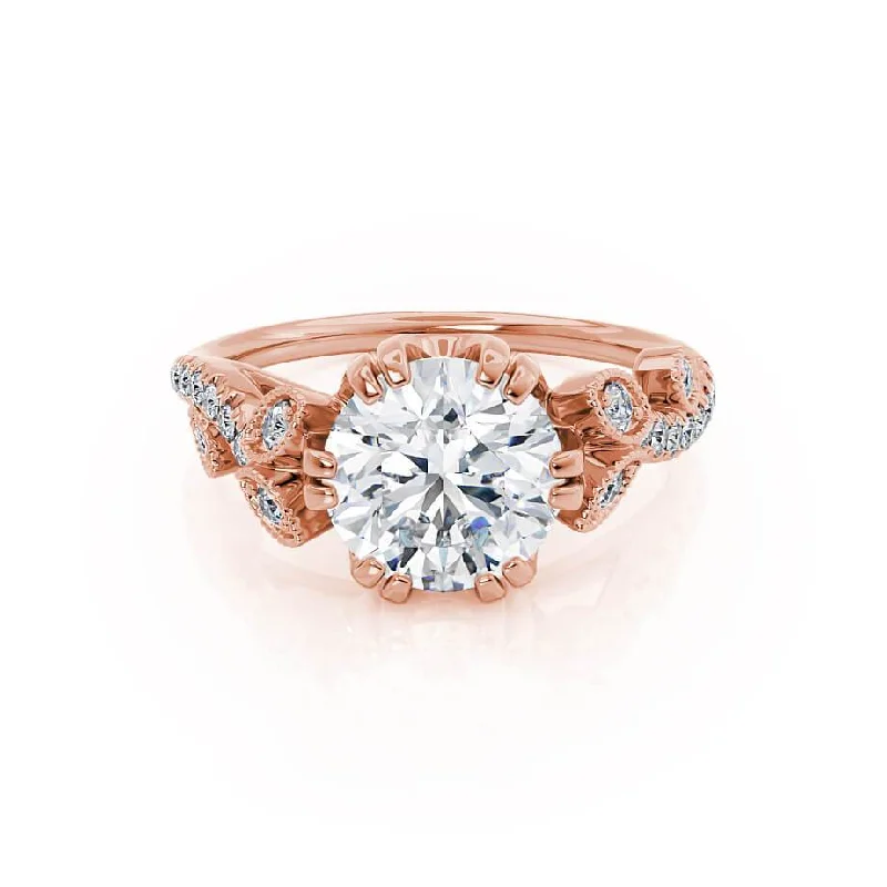 Solitaire diamond engagement ring with a platinum setting for a classic and elegant lookFLEUR - Round Moissanite & Diamond 18k Rose Gold Shoulder Set Ring