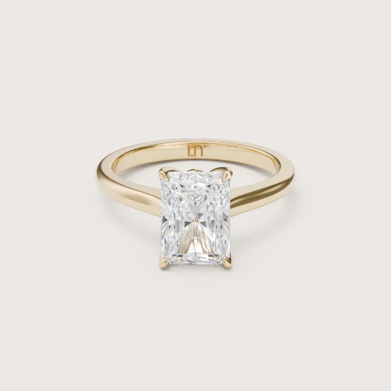 Marquise - cut diamond engagement ring with a split - shank band in platinumAstar Radiant Cathedral