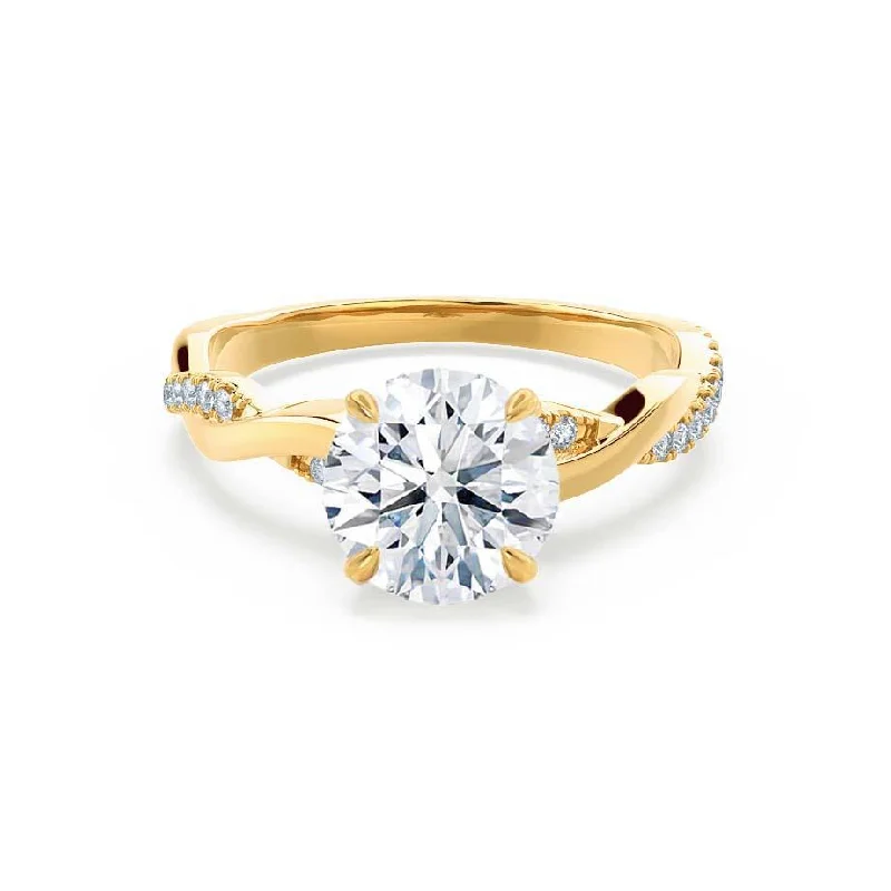 Solitaire diamond engagement ring with a platinum setting for a classic and elegant lookEDEN - Ready to Ship 0.90ct Round Lab Diamond 18k Yellow Gold Vine Solitaire Ring