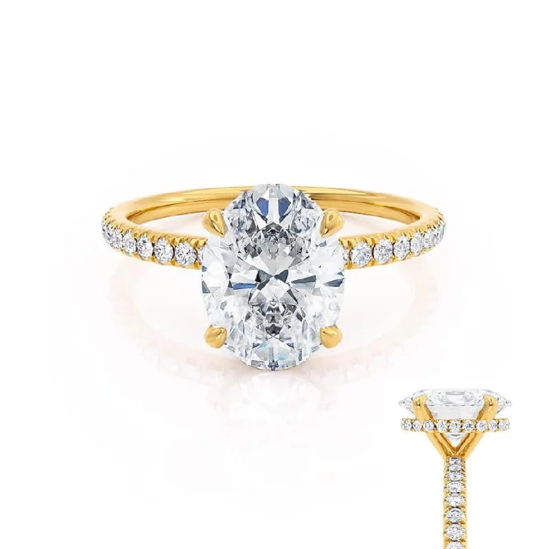 Halo diamond engagement ring in 18K white gold with a center oval - cut stoneLIVELY - Ready to Ship 1.00ct Oval Lab Diamond 18k Yellow Gold Petite Hidden Halo Pavé Shoulder Set