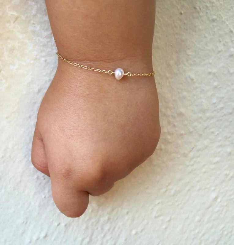 Pearl Bracelets with Celtic Knotwork - Inspired Chains for a Symbolic Touch14K Pearl bracelet