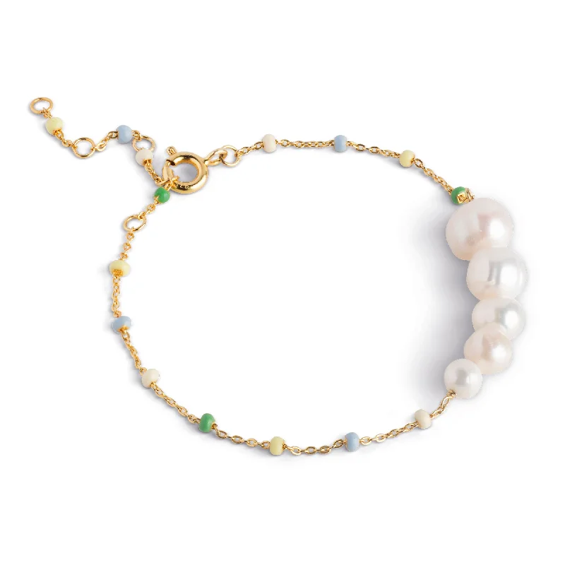 Leather - Wrapped Pearl Bracelets with Studded Details for a Rock - Chic VibeBracelet, Lola Carmen