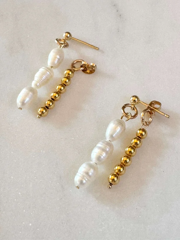 Leather - Wrapped Pearl Bracelets with Studded Details for a Rock - Chic VibeAriella Pearl Beads Earrings