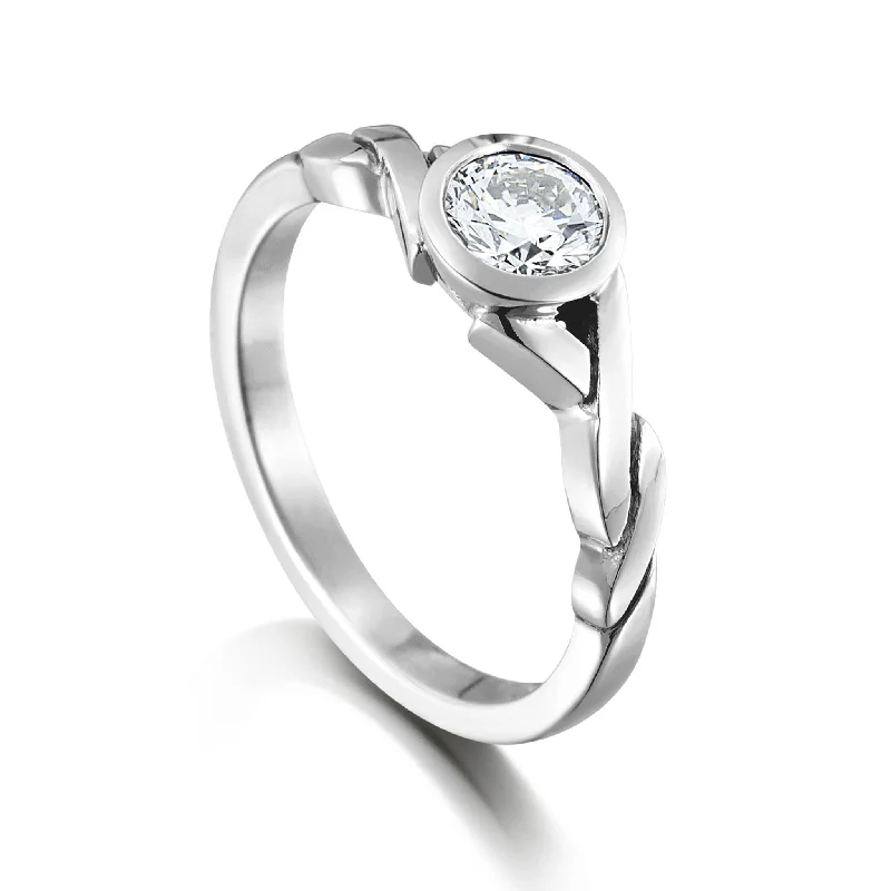 Three - Stone Engagement Rings Symbolizing Love's Past, Present, and Future with Asscher - Cut DiamondsCeltic Twist 4.75mm Cubic Zirconia Solitaire Ring in Sterling Silver