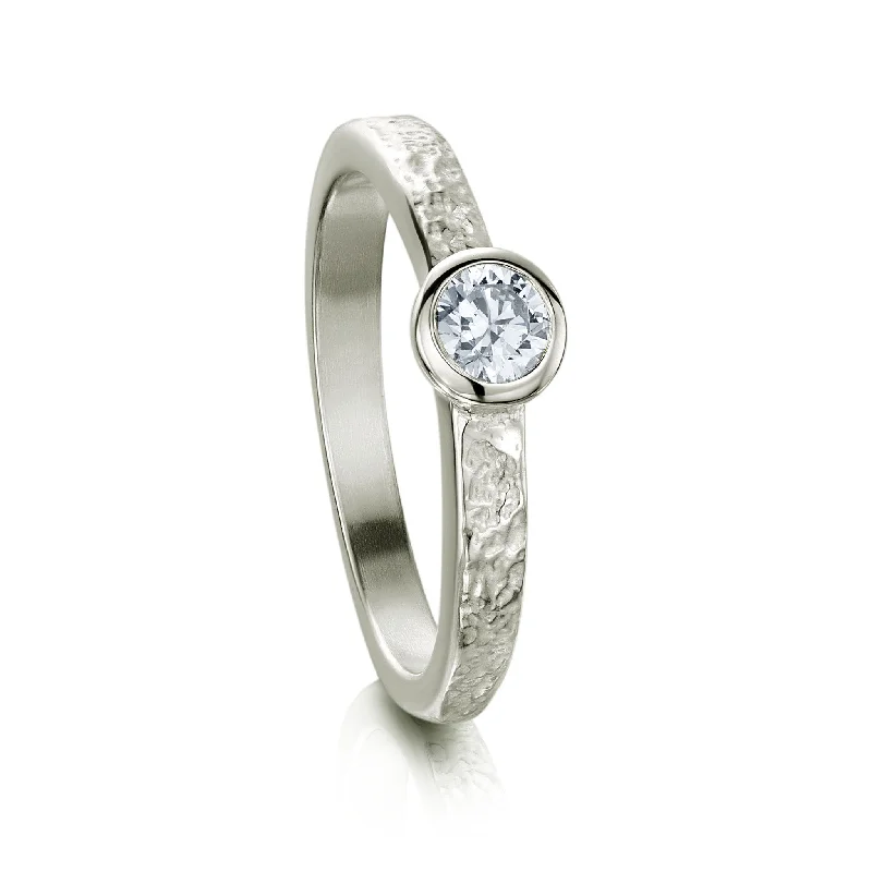 Oval Cut Engagement Rings in Palladium with a Hidden Halo for a Surprise SparkleMatrix 0.25ct Diamond Ring in Platinum