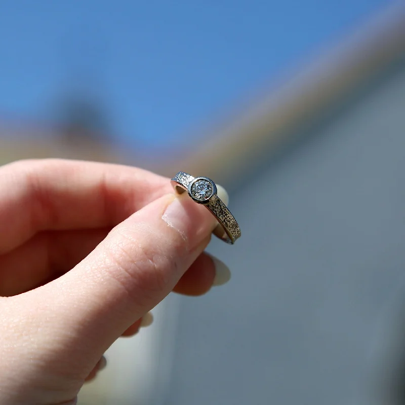 Cathedral - Style Engagement Rings with a Raised Center Stone and Intricate MetalworkMatrix 0.40ct Diamond Ring in Platinum