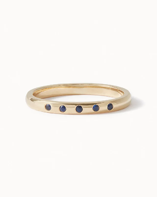 Sapphire - and - Diamond - Accented Wedding Bands in Platinum for a Royal and Sophisticated LookSolid Yellow Gold Five Stone Sapphire Ring